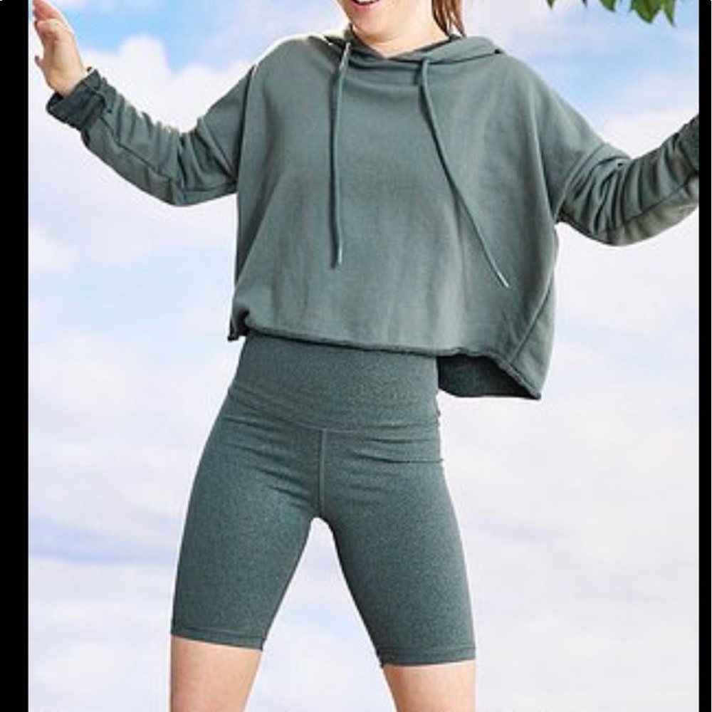 Cropped green hoodie.